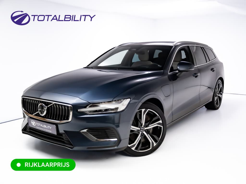 Volvo V60 2.0 T8 Plug-in hybrid AWD Ultimate Bright | Bowers & Wilkins | Panorama dak | Trekhaak | Stoel- Stuur en achterbankverw. | — foto 1 van 25